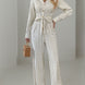 Striped Notched Long Sleeve Tie Waist Jumpsuit