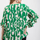 Geometric print ruffled bell sleeve woven top
